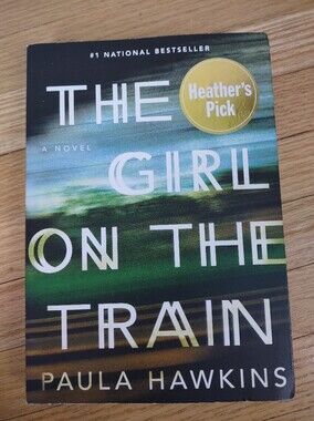 The Girl on the Train by Paula Hawkins – Paperback Thriller Novel